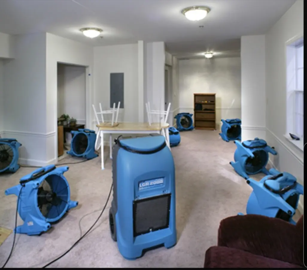 Air movers and dehumidifier setup for Water Extraction & Removal in McCalla